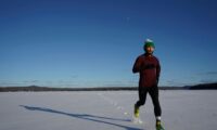 man running in the snow